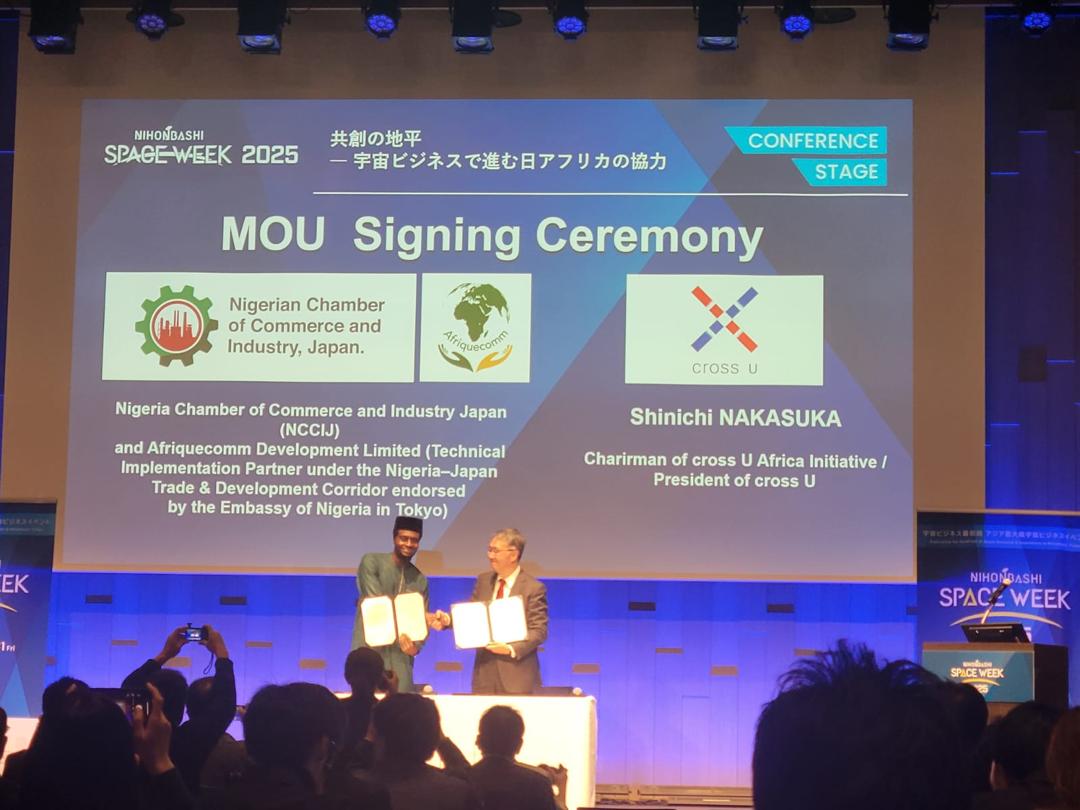 MoU signing ceremony at Nihonbashi Space Week 2025 with Afriquecomm, NCCIJ and Cross U identities visible